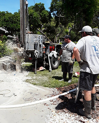 The Morin family. Jon, Jonjon and Nick drilling deep wells